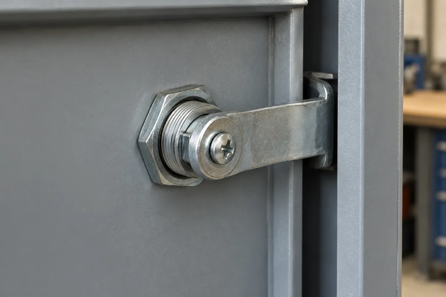 Rear view of a cam lock installed in a cabinet door with the cam rotated 90 degrees to engage the frame, the locked position every cam lock diagram has to show